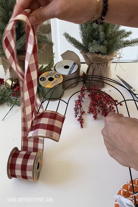 Dollar Tree Candy Cane Wreath - Mother Thyme Dollar Tree Candy Cane Wreath, Dollar Tree Candy Cane, Make A Ribbon Wreath, Candy Cane Wreath Tutorial, Candy Cane Wreath Diy, Bubble Wreath, Mother Thyme, Ribbon Wreath Diy, Mesh Crafts