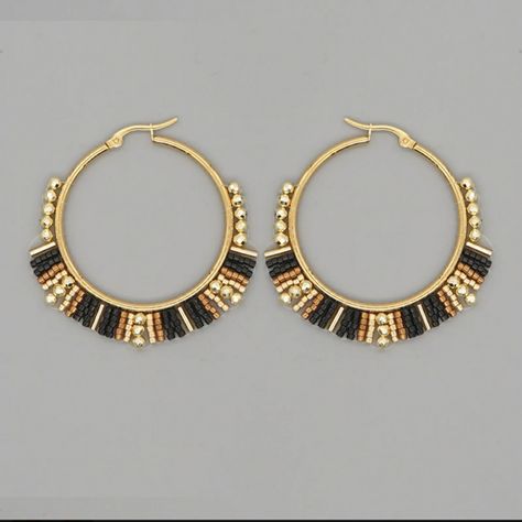 Miyuki Rice Beads Handwoven Hoop Earrings Black & Gold Beads Gold Tone Hoops The Beads On These Earrings Are Woven Very Securely! I Also Have These In Red & Orange And Blue & White. Boho / Bohemian Vintage Style Retro Style Ethnic Style Gypsy Hippie Festival, Coachella, Music Festival, Burning Man, Stagecoach. Bundle & Save. New To Poshmark? Use My Code Bethmgold When Joining For $10 Off Your First Purchase. @Bethmgold I Relist Items Every 1-2 Months (If They Don't Sell Or Are A Multiple Boutiqu Seed Bead Hoop Earrings, Bohemian Vintage Style, Coachella Music Festival, Coachella Music, Turquoise Hoop Earrings, Earrings Classic, Rice Bead, Miyuki Beads, Colorful Earrings