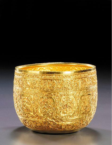 A Thai gold bowl, 20th century the sides chased with compartments containing symbols of the Zodiac, within flower and animal borders height 7.6cm, 3in Flower And Animal, Antic Jewellery, Burmese Art, Golden Bowl, Gold Bowl, Gold Temple Jewellery, Pooja Items, Silver Pooja Items, Amulet Charm