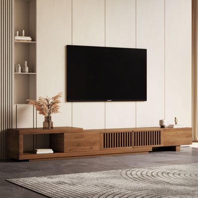 This expandable adjustable console TV stand adds a touch of asymmetrical artistic style to your entertainment area. It features two large drawers and two cabinet doors for storage. Made of high-quality paint-free board, this TV stand can extend horizontally up to 103 inches.Free MovementThis TV cabinet can horizontally expand and contract to fit different living room sizes, saving space.Large Storage SpaceTwo pull-out drawers and one extendable shelf, along with two dust-proof cabinet doors, pro Tv Console Cabinet, Console Tv Stand, Residence Interior, Cabinet With Storage, Wood Tv Console, Tv Console Table, Console Tv, Living Room Size, Console Cabinet