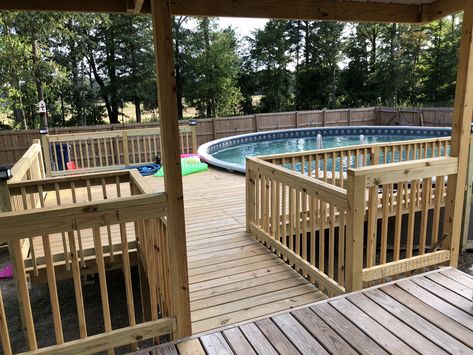 We built this deck off the existing porch. Pool by Azure Pools in Ruston, Louisiana. 30’ Round Pool. Above Ground Pool Off Back Porch, Round Above Ground Pool With Deck Off House, Porch Around Above Ground Pool, Pool Built Into Deck, Back Porch Pool Deck, Above Ground Pool Off Back Deck, Above Ground Pool Deck Ideas Off Back Porch, Above Ground Pool Off Deck, Above Ground Pool Deck With Pergola