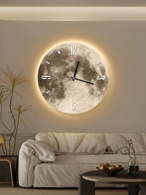 Key Features: 1.Crystal surface for a sophisticated touch 2.11.81 inches diameter for a prominent presence 3.Choose between ordinary or LED-upgraded models 4.LED offers three adjustable lighting methods 5.Elevate your living room with this trendy 2023 fashion piece Description: Enhance your living space with our Crystal Lunar Clock, a 2023 fashion statement. The 11.81-inch diameter circular design, crafted with crystal, adds a touch of sophistication. Choose between the ordinary model or upgrade to the LED version, offering three lighting methods for a personalized ambiance. Illuminate your home with this artistic clock that doubles as a wall lamp, blending internet celebrity style with advanced design. Elevate your decor with the perfect combination of art and functionality. Modern Wall Clock Design, Moon Clock, Lunar Magic, Corner Floor Lamp, Led Wall Clock, Wall Clocks Living Room, Bedroom Patio, Clock Living Room, تصميم للمنزل العصري