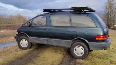 This 1997 Toyota Previa is converted into a budget-minded camper van that also has modest off-road capability. Previa Camper, Off Road Rv, Custom Camper Vans, Toyota Previa, Coilover Suspension, Cool Campers, Rock Crawler, Camper Conversion, Land Rover Series