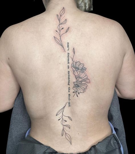 Adding To Spine Tattoo, Spine Tattoo With Quote And Flower, Floral Spine Tattoo Black Women, Vine Tattoo With Quote, Flower Spine Tattoo Minimal, Flower And Words Spine Tattoo, Quote And Flower Spine Tattoo, Vines Around Quote Tattoo, Poison Ivy Spine Tattoo