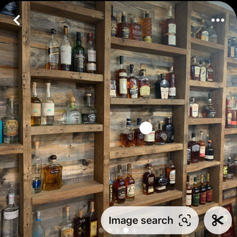 Small Bar Display, Floating Shelves For Liquor Bottles, Shelving For Liquor Bottles, Small Rustic Bar Ideas, Man Cave Display Shelves, Wine Cellar Shelving, Man Cave Shelves, Wall Bar Shelves, Basement Bar Liquor Display