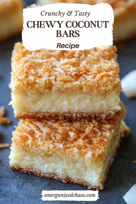 These Chewy Coconut Bars are made with simple ingredients: butter, eggs, flour, sugar, vanilla, unsweetened coconut flakes, and the secret ingredient—marshmallows. They're the perfect treat to enjoy with coffee or tea, and for an extra indulgent experience, warm them in the microwave for 10-15 seconds and top with a scoop of vanilla ice cream. In Coconut Butterscotch Bars, Toasted Coconut Marshmallows, Coconut Macrons Recipes, Dream Bars Recipe Coconut, Chewy Coconut Bars, Coconut Treats Easy, Coconut Bars Recipe Condensed Milk, Coconut Baking Recipes, Coconut Desserts Recipes