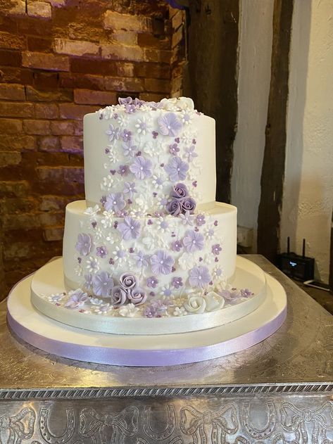 Joelle - small 2 tier wedding cake decorated with simple sugar flowers and tiny roses in shades of purple and lilac flowing down the front Small 2 Tier Wedding Cake, Wedding Cake Two Tier, Wedding Cakes Lilac, 2 Tier Wedding Cake, Quince Cakes, 2 Tier Wedding Cakes, Lavender Wedding Cake, Quince Cake, Purple Wedding Cake