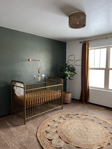 Dark Green Curtains Nursery, Dark Green And Gold Nursery, Urbane Bronze Nursery, Green Nursery Wall Color, Pewter Green Nursery, Nursery Room Themes Neutral, Dark Green Nursery Accent Wall, Army Green Nursery, Moody Green Nursery