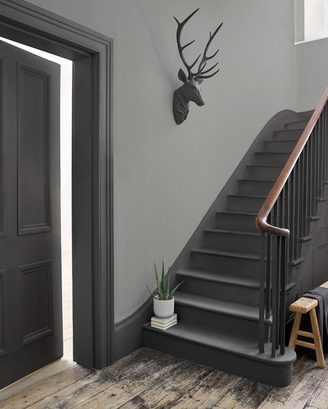 How fab is this grey hallway? We love the combination of the darker woodwork and the pale walls. #hallway #stairs #grey #realhomes Grey Hallway, Gray Stairs, Hallway Paint, Victorian Hallway, Painted Staircases, Hallway Colours, House Staircase, Hallway Inspiration, Hallway Designs