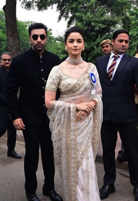 How Alia Bhatt Is Slowly Transforming Into A Fashion Icon (And What Does That Mean For Her Career) Bollywood Dress Wedding, Alia Wedding Dress, Luxury Bollywood Saree For Festive Occasions, Luxury White Saree With Self Design, Luxury Bollywood Style Off-white Kurta, Luxury Bollywood Style Off-white Gown, Luxury White Saree For Celebration, Luxury Bollywood Style Cream Saree, Luxury White Bollywood Style Pre-draped Saree