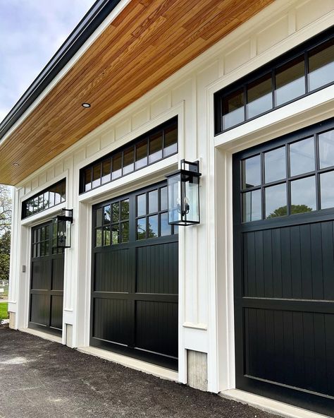 Black Wood Garage Doors, Black Double Garage Doors, Modern Farmhouse Garage Doors Black, Garage Doors Modern Farmhouse, Black Garage Doors With Windows, Black Modern Garage Door, Black Garage Door With Windows, Garage Doors On White House, White Oak Garage Door