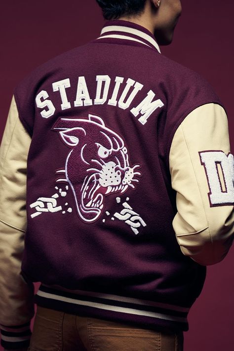 The centerpiece of the latest STADIUM collection is our Varsity Letterman Jacket in “Burgundy,” which features embroidered patches that are a nod to the iconic styling associated with collegiate sportswear. Varsity Jacket Outfit Mens, Letterman Jacket Ideas, Letterman Jacket Outfit, Prom Jacket, Varsity Jacket Outfit, Varsity Letterman Jackets, Stadium Goods, Letterman Jacket, Patches Jacket