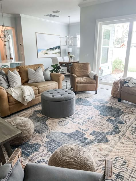 Coastal Family Rooms Casual, Beige Couch Living Room Pop Of Color, Gray And Blue Coastal Living Room, Light Blue Lounge Room Decor, Light Blue Farmhouse Living Room, Light Blue Brown Living Room, Sand And Blue Living Room, Living Rooms With Blue Accents, Sea Glass Living Room