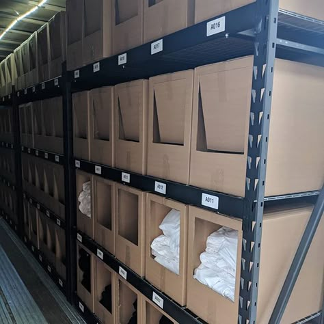 Stock Organization Storage, Retail Storage Organization, Warehouse Shelving Storage, Godown Storage Ideas, Retail Backroom Organization, Boutique Warehouse Organization, Small Business Stock Organization, Warehouse Organization Inventory, Clothing Inventory Storage