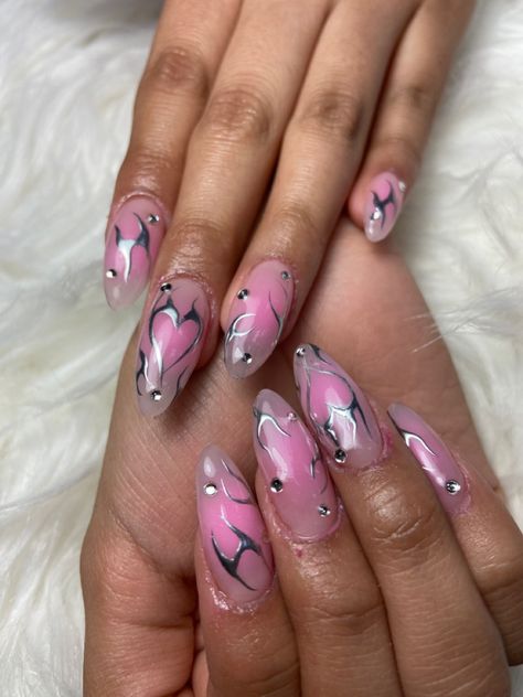 hearts flames fire gothic y2k gems rhinestones airbrush nails design almond shape Fire Heart Nail Design, Artsy Almond Nails, Almond Fire Nails, Y2k Nails Acrylic Almond, Airbrush Art Nails, Nails Design Almond Shape, Almond Y2k Nails, Heart Flame Nails, Y2k Nails Almond