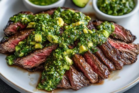 Introduction Skirt Steak with Avocado Chimichurri is a flavorful and vibrant dish that pairs the rich, juicy skirt steak with a fresh and creamy avocado chimichurri sauce. The chimichurri sauce, ... Learn more Chimichuri Recipe, Cheesecake Chimichangas Recipe, Avocado Chimichurri, Steak With Chimichurri Sauce, Flat Iron Steak, Sliced Steak, Beet Recipes, Chimichurri Sauce, Fresh Salsa