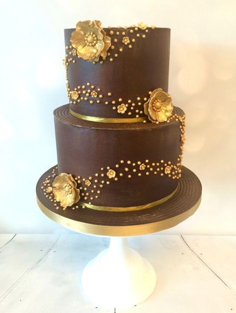 12 chocolate wedding cakes #wedding #weddingcake Anniversary Chocolate Cake Design, Brown Cake Decoration, Chocolate Anniversary Cake, Brown Wedding Cakes, Henna Cake, Chocolate Wedding Cakes, Christmas Wedding Cakes, 50th Anniversary Cakes, Golden Cake