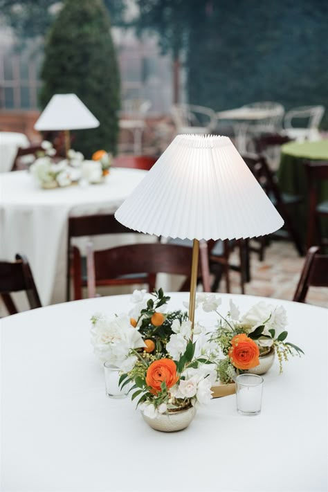 This wedding at Race and Religious was a visual delight! Orange pops in the centerpieces and green and white linens made a beautiful statement. Lamps on tables added a warm, comforting touch, enhancing the courtyard’s natural beauty with sophistication and charm. Lamp Centerpiece Wedding, Green And Yellow Wedding, Statement Lamps, Lamp Centerpiece, Malibu Elopement, Wedding Ambiance, Courtyard Wedding, White Linens, Wedding Green