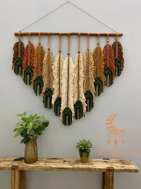 Thank you for visiting my shop! Set of macrame leaves wall hanging  inspired by colorful peacock feathers. They are made from rustic cotton fibers to create unique wall art. These set rustic macrame leaves are based on eco-friendly 100% cotton ropes. We Inspired by the colorful foliage of temperate forests. If you are a home decor lover, you cannot ignore this unique set of macrame leaves. They will make your lovely room become liberal and bring your own personality color. Material: - 100% cotto Branch Wall Decor Diy, Macrame Peacock, Boho Decor Style, Branch Wall Decor, Macrame Feather Wall Hanging, Unique Macrame, Feather Wall Hanging, Diy Boho Decor, Crochet Wall Hangings