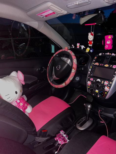 Hello kitty Hello Kitty Car Interior Aesthetic, Hello Kitty Car Inside, Car Decorations Interior Y2k, Car Theme Ideas Interior, Black And Pink Car Interior Aesthetic, Hello Kitty Car Decorations, Hello Kitty Steering Wheel Cover, Car Decorations Interior Hello Kitty, Mcbling Car Interior