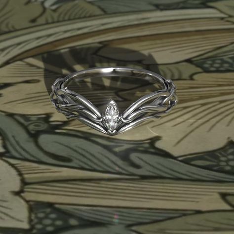 To see more variations of this ring, click here: https://www.etsy.com/shop/MetalWendler?ref=seller-platform-mcnav&search_query=woodlands+tiara To see our entire Elven collection, click here: https://www.etsy.com/shop/MetalWendler?ref=seller-platform-mcnav&search_query=elvish This Woodlands Vine Fantasy themed engagement ring is made from recycled gold and is handmade with a comfort fit to your size. Perfect for the nature lover.  Ring Specs: ● Band is 6.8mm at widest point, then tapers thinner t Lord Of The Rings Inspired Wedding Ring, Elven Engagement Ring Silver, Comfortable Engagement Ring, Elven Engagement Rings, Wedding Rings Silver Vintage, Fantasy Engagement Rings Unique, Elvish Rings Engagement, Elven Wedding Ring, Lord Of The Rings Engagement Ring