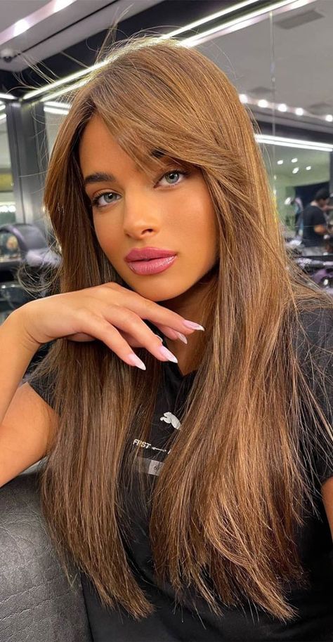 Brown Hair Brown Money Piece, Mixed Brown Hair Color, Light Cinnamon Brown Hair, Brown Hair Trends Summer 2023, Cinnamon Whiskey Hair Color, Caramel Brown Hair With Bangs, Light Brown Shades Of Hair, Hair Color For Bronze Skin, Goldish Brown Hair Color