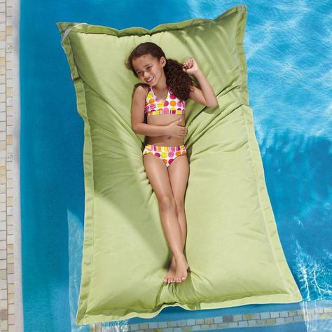 This swimming pool float is constructed of breathable, marine-grade Sunbrella fabric. It's flexible, keeps it's cool and is filled with millions of loose buoyant foam beads. Swim Equipment, Lounge Pool, Poolside Decor, Pool Fencing, Lake Fun, Pool Stuff, Swimming Pool Floats, Pool Fun, Pool Games