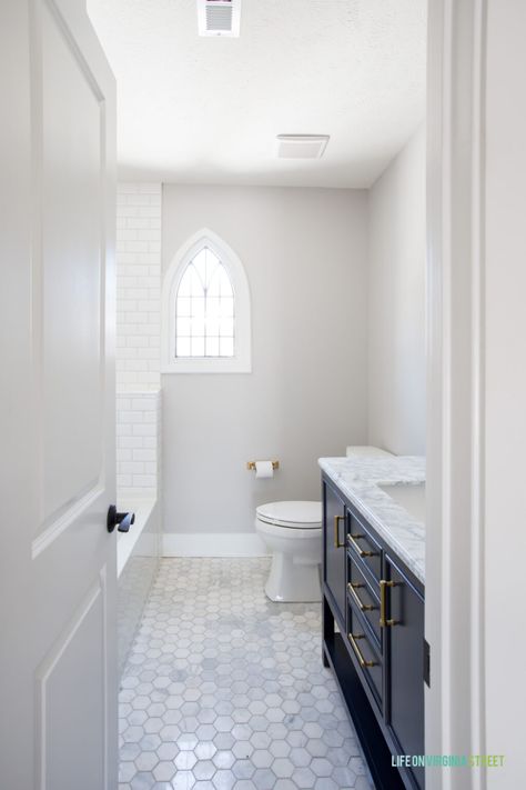 The Tudor House Renovation Reveal - Life On Virginia Street Beige Bathroom Floor Ideas, Cambria Montgomery Quartz Bathroom, Tile Behind Toilet, Galley Bathroom Ideas, Bathroom Tile Floor Ideas, Updated Tudor, Bathroom Timeless, Bathroom 2024, Before And After Home