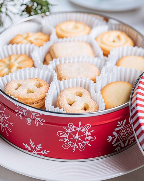 This Easy Cookie Tin Hack Makes the Best Holiday Dessert | The Kitchn Cookie Tin Cake Recipe, Cookie Tin Cake, Cookie Tin Recipes, Christmas Cookie Tin Recipes, Christmas Tins Treats, Christmas Cookie Tin Ideas, Butter Cookies Tin, Cookie Pudding Dessert, Danish Cookies