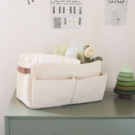 Modern Nursery Decor | West Elm Diaper Storage Ideas, Changing Table Organization, Basket Nursery, Baby Room Storage, Nursery Rocker, Diaper Changing Station, Diaper Organization, Diaper Caddy, West Elm Kids