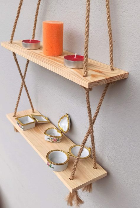 Double wooden shelf with rope. The products in the image are not included in the price. It is made of wood and is handmade. Diy Rope Shelves, Diy Hanging Rope Shelves, Wooden Wall Shelf Ideas, Macrame Shelf Hanger, Hanging Shelf Ideas, Wooden Shelf Ideas, Shelves With Rope, Shelf With Rope, Diy Macrame Plant Hanger Pattern