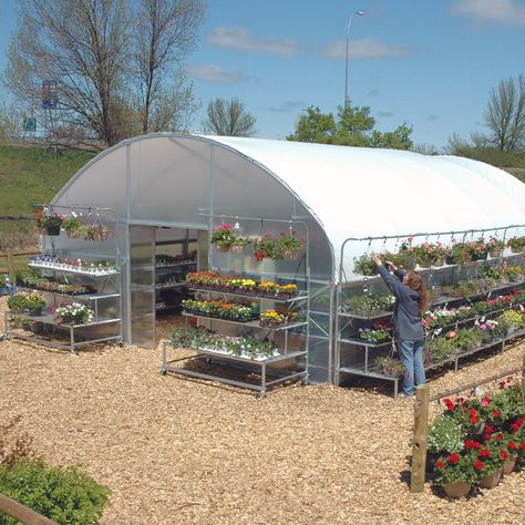 The Garden Mart is designed to be a modular, low-cost and movable sales building for added spring plants sales. This popular retail model has been engineered for superior strength, easy future expansion and dramatically simplified setup. It offers protection for your plants and shopping comfort for your customers. The Garden Mart includes built-in benches, handy roll-up side ventilation, four runs of hanging basket purlins, double-sliding end doors, and easy snap-together assembly.2" o.d. 14 gau Home Greenhouse, Water Tube, Greenhouse Plans, Diy Greenhouse, Spring Plants, Shade Cloth, Home Vegetable Garden, Greenhouse Gardening, Built In Bench