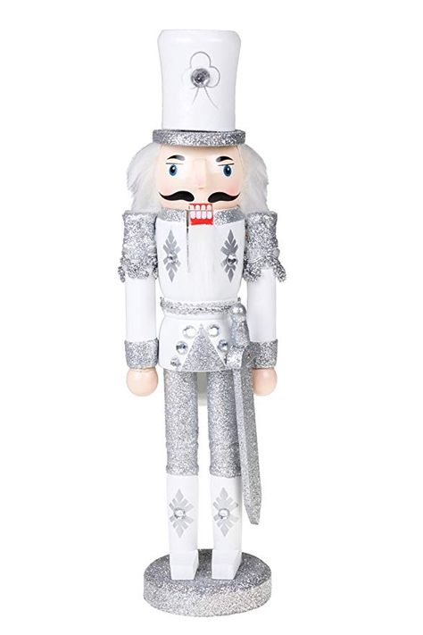 White Nutcracker, Silver Clothes, Traditional Nutcracker, Nutcracker Christmas Decorations, Silver Christmas Decorations, Nutcracker Soldier, Traditional Fireplace, Festive Holiday Decor, Silver Christmas