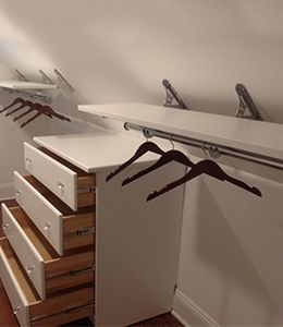 Slanted Closet Ideas, Slanted Wall Closet, Slanted Ceiling Closet, Closet Rod Bracket, Angled Wall, Attic Bedroom Storage, House Closet, Attic Bedroom Designs, Hallway Closet