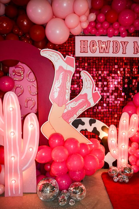 Howdy 18th birthday party, Cowgirls and disco balls. Lets go girls! Light up cactus in a light pink with the light up 18 and custom signage Howdy Maddy. Cowboy Pink Party, 40th Birthday Cowgirl Theme, Disco Cowgirl Birthday Party One, Cowboy Disco Birthday Party, 18th Pink Birthday Party, Disco Cowgirl Bday Party, Pink Western 21st Birthday Party, 18th Cowgirl Party, Glam Cowboy Party