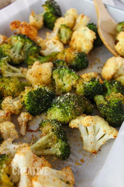 Easy and delicious oven roasted broccoli and cauliflower. A simple vegetable pairing for your next dinner. Brocoli And Cauliflower Recipes Healthy, Best Roasted Broccoli And Cauliflower, Oven Baked Broccoli And Cauliflower, Broccoli And Cauliflower In Oven, Roasted Brocolli And Cauliflower Recipes, Roast Cauliflower And Broccoli, How To Cook Broccoli And Cauliflower, Easy Broccoli And Cauliflower Recipes, Broccoli And Coliflower Recipes Dishes