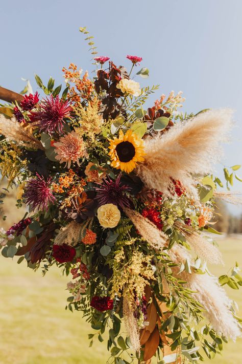 Autumn wedding at a Rustic Montana venue. Sunflower Fall Bouquet, Fall Wildflower Bouquet Boho Wedding, Fall Wedding Bouquets With Sunflowers, Fall Flowers Wedding, Fall Sunflower Weddings, Wedding In Montana, Sunflower Floral Arrangements, Moab Wedding, Fall Mountain Wedding