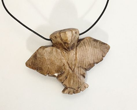 Eagle Totem Necklace Hand Carved Walnut Stain  by PocoLeonStudio on etsy.com Surrealism Fashion, Eagle Totem, Totem Necklace, Walnut Stain, Dnd Characters, Moth, Surrealism, Insects, Hand Carved