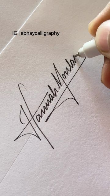 Abhay Pratap Singh Rathore on Instagram: "Want Name Design for yourself? DM ‘Signature’ This one is for Hannah Montana And its NOT FREE Pen - @marvyuchida_india Fineliner Pen 0.5 on a Bond Paper . #signature #handwriting #signaturedesign #calligraphy #lettering #handmade #trendingreels #reels #trendy #reelsinstagram #reelsvideo #ballpen #uniball #artistsoninstagram #signatureday #ethanhunt #missionimpossible #tomcruise #fontdesign #font #graphicsdesign #design #handwritten #celebritystyle #cel Hannah Signature Ideas, H Letter Signature Ideas, O Signature Ideas, Hannah In Cursive, Aesthetic Signature Ideas For Letter J, Hannah Calligraphy, H Signature Ideas, Hannah Lettering, Signature Letters