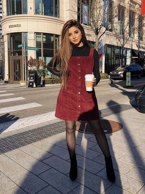 Courderoy Dress Outfits Fall, Red Overall Dress Outfit, Maroon Overalls Outfit, Red Denim Dress, Curdoroy Dress Outfits, Comfy Christmas Party Outfits, Dungaree Dress Outfit Winter, Vest Dress Outfits For Women, Corduroy Dress Outfit Fall