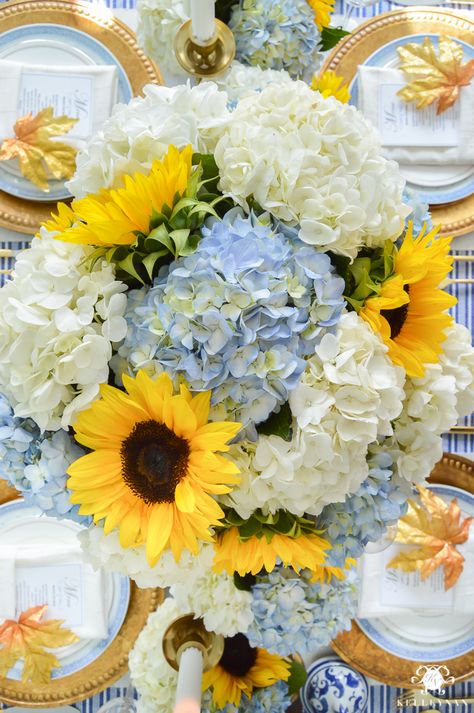 Big floral centerpiece for table ideas in hosting Thanksgiving Dinner- Sunflowers with blue and white hydrangeas in blue and white ginger jars - Kelley Nan Sunflower Centerpieces, Sunflower Themed Wedding, White Hydrangeas, Fall Flower Arrangements, Dusty Blue Bridesmaid Dresses, Yellow Sunflowers, August Wedding, Yellow Wedding, White Hydrangea