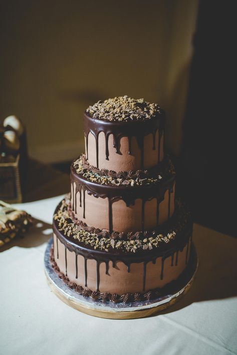 Dripping Hot Chocolate Over Your Cake | 10 Ways to Include Hot Chocolate in Your Wedding | https://www.theknot.com/content/hot-chocolate-wedding-ideas Chocolate Dripping, 3 Layer Cakes, Whiskey Cake, Wedding Cake Images, Chocolate Drip Cake, Chocolate Wedding, Torte Cupcake, Wedding Chocolate, Wedding Cake Recipe