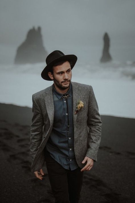 a relaxed groom's look with a grey jacket, a slate grey shirt, black pants, a black hat plus a bolo tie Groom Bohemian, Fall Groom, Moody Photos, Groomsmen Poses, Landscapes Beautiful, Strong Woman Tattoos, Adventurous Elopement, Beautiful Women Quotes, Iceland Elopement