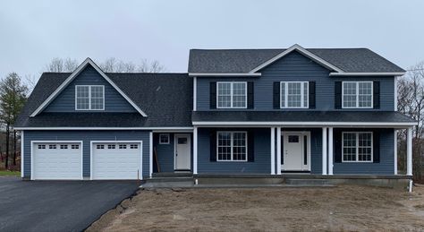 Love the color contrast of our new sidings ❤️ Black Shutters Blue House, Blue House Black Garage Door, Dark Blue Colonial House Exterior, Blue House Exterior With Shutters, Blue House With Black Shutters, Blue House Black Shutters, Pacific Blue Vinyl Siding, Pacific Blue Siding, Blue Siding House