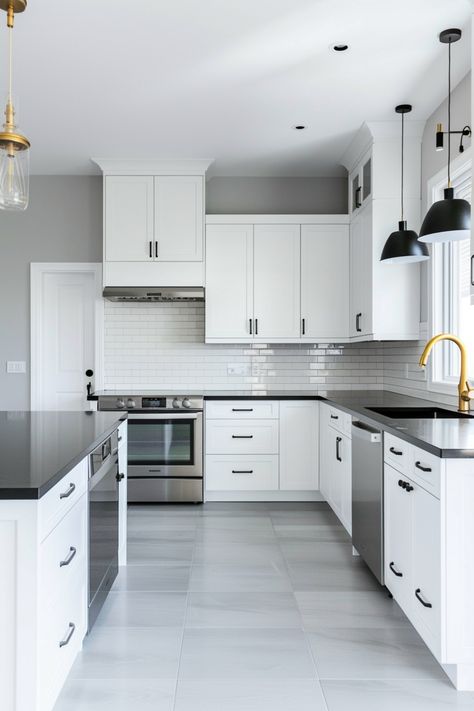 Use these tips to make your kitchen look extra-chic with white kitchen cabinets and black countertops. Small Kitchen Black And White Cabinets, Gray Black And White Kitchen, White Kitchen And Dining Room, Kitchen Cabinets With Black Countertops, White Cabinets And Black Countertops, Cabinets With Black Countertops, White Cabinets Black Granite, White Cabinets Black Countertops, Kitchen Black Counter