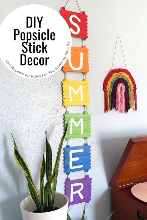 Cute and easy DIY wall art idea! Make cute popsicle stick decor to welcome summer with a fun rainbow sign that’s easy to make using dollar store supplies. Learn how at Ideas For The Home By Kenarry. #IdeasForTheHome #Kenarry Popsicle Stick Decor, Diy Rainbow Decorations, Easy Diy Wall Art, Cute Popsicle, Rainbow Room Decor, Wall Art Idea, Popsicle Stick Art, Stick Decor, Rainbow Sign