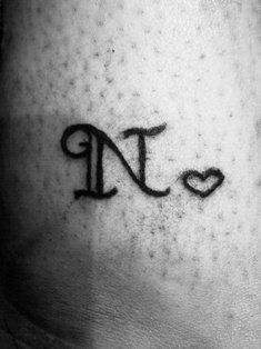 Tatto Letters, N Wallpaper Letter Aesthetic, Alphabets Design, Cris Jnr, N Tattoo, Monogram Tattoo, The Letter N, Flower Wrist Tattoos, Finger Tattoo Designs