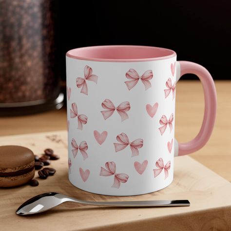 Add some color to your routine with this two-tone, custom accent coffee mug. This 11oz mug features an accented C-Handle that is comfortable to use, as well as an accented interior to add more contrast and character. With your design on this mug, you get an instant winner of a product.  .: White ceramic with colored interior and handle .: C-handle .: Eye-catching color contrast  .: Lead and BPA-free Preppy Mug, Cute Mugs Aesthetic, Aesthetic Coquette Room, Pink Room Aesthetic, Mugs Aesthetic, Room Decor Pink, Coquette Room Decor, Coquette Room, Pink Cups