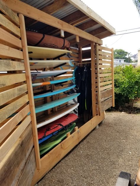 30"x12'x8' Corrugated steel roof and solid wood structure with swinging barn door style. Holds 10 surfboards up to 10' in length, several wetsuits. Skateboards, wax, combs, and leashes. #ParagonSurfboards #Stuckybumps #Surfshed #SanDiegoSurf #921OB #ChannelIslandSurfboards Surfboard Storage Outdoor, Surfboard Shed Storage, Surfboard Storage Garage Ceilings, Surf Board Storage Shed, Surf Board Storage Outside, Outdoor Surfboard Rack, Surfboard Storage Shed, Surf Storage Ideas, Surf Shed Ideas