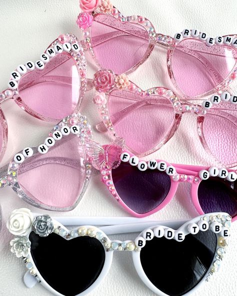 Calling all wedding vendors! Do any of you have a Swiftie bride that would love some fun sunnies for their wedding day photos? Or are you planning a styled shoot and want something unique? Let me know! I would love to chat about how we can work together 💜 #handmade #smallbusiness #wedding #bridesunglasses #bridalaccessories #bacheloretteparty #weddingparty #bridesmaidgifts #etsyseller #bejeweled #etsyshop #customgift Sunglass Decorating Craft, Wedding Sun Glasses, Sunglasses Diy, Bride Sunglasses, Diy Jar, Funky Glasses, Wedding Day Photos, Diy Jar Crafts, Bridemaids Gifts